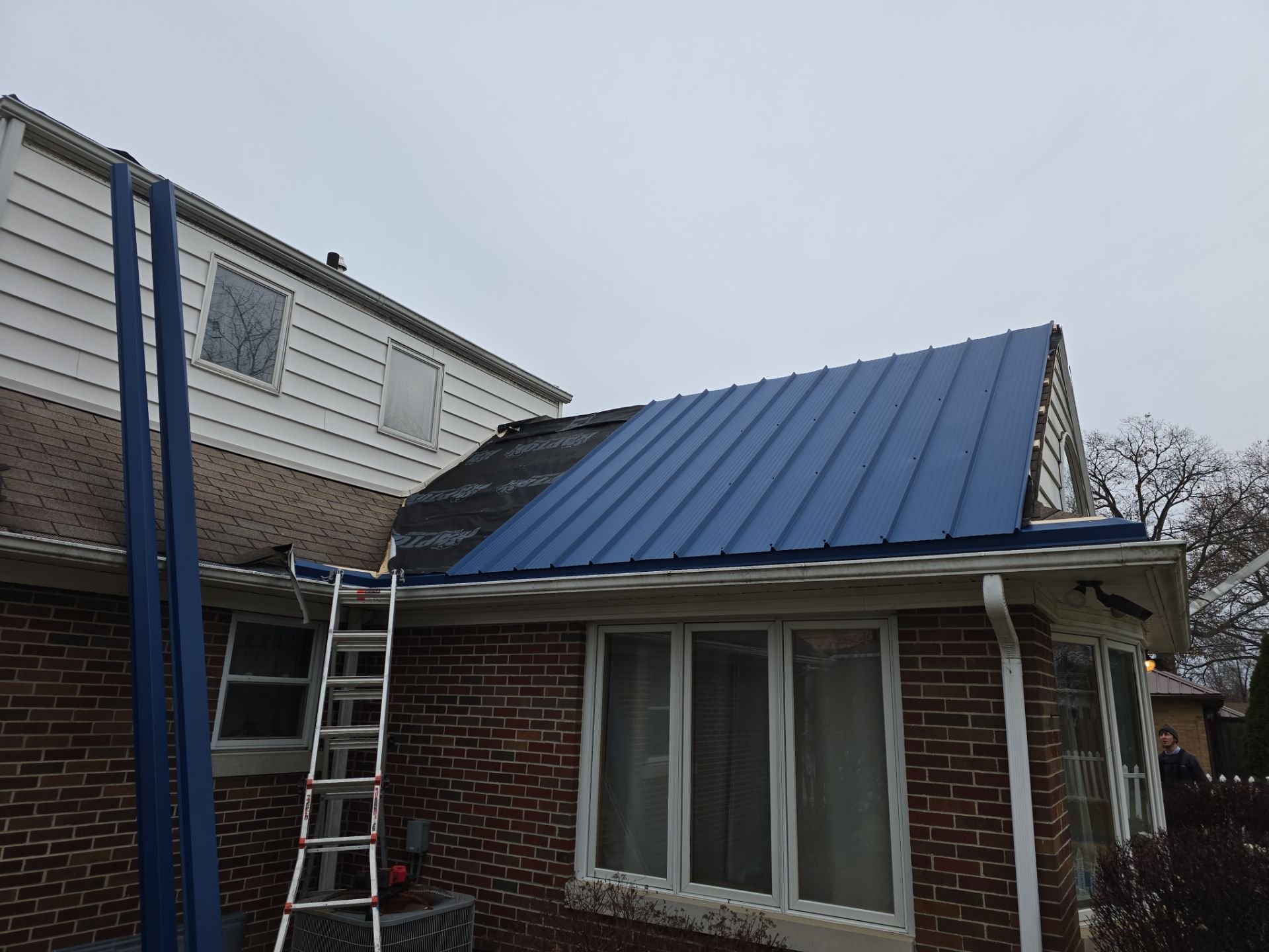 shingle to metal roof in Elkhart, Indiana