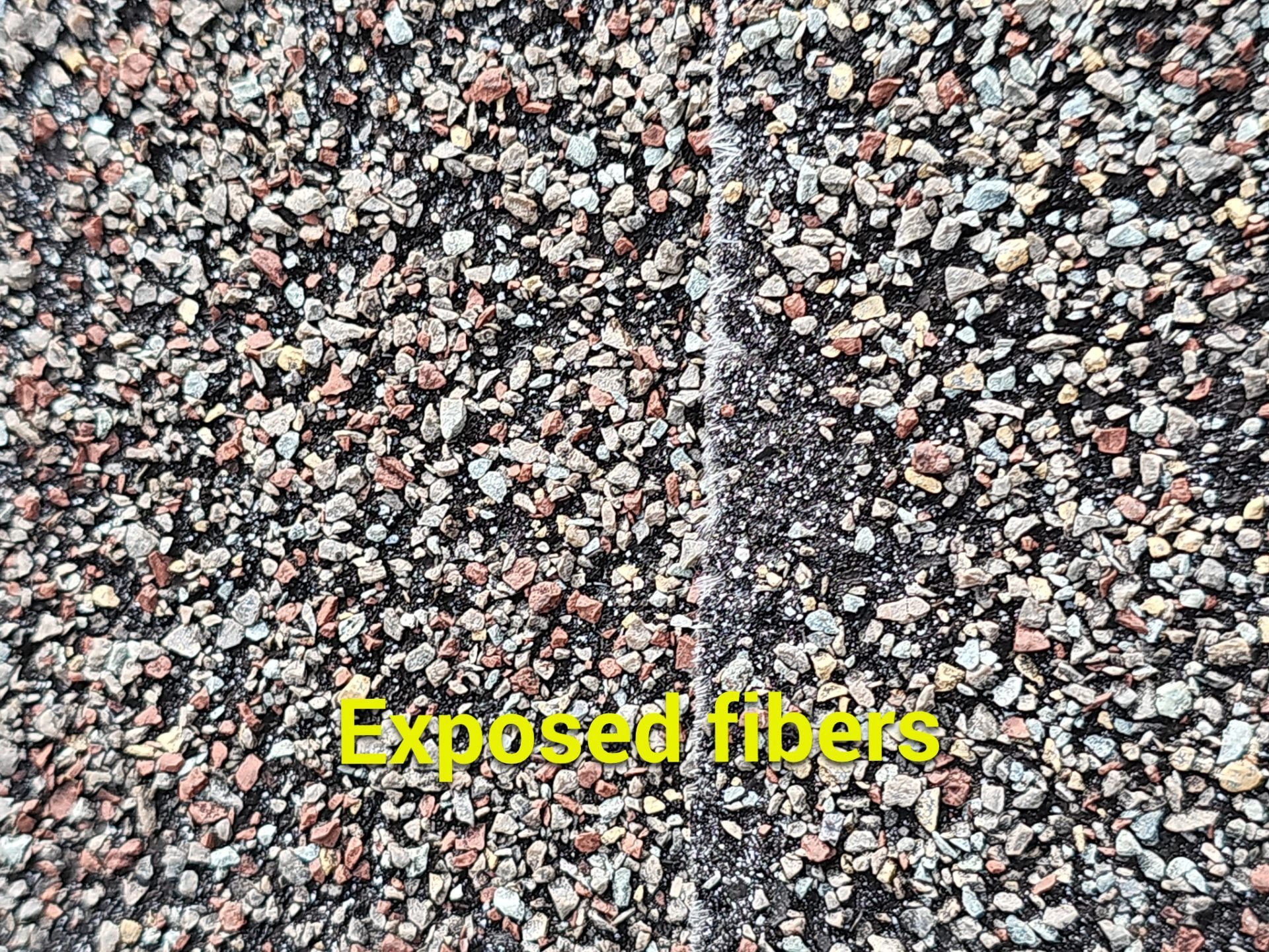 Exposed fibers on Granger, Indiana roof