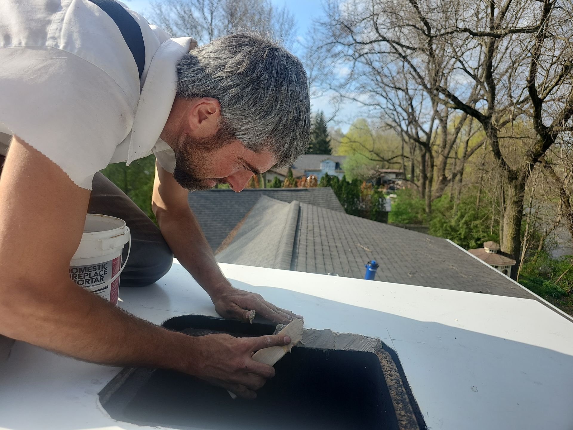 Equity Roofing encapsulating leaking chimney