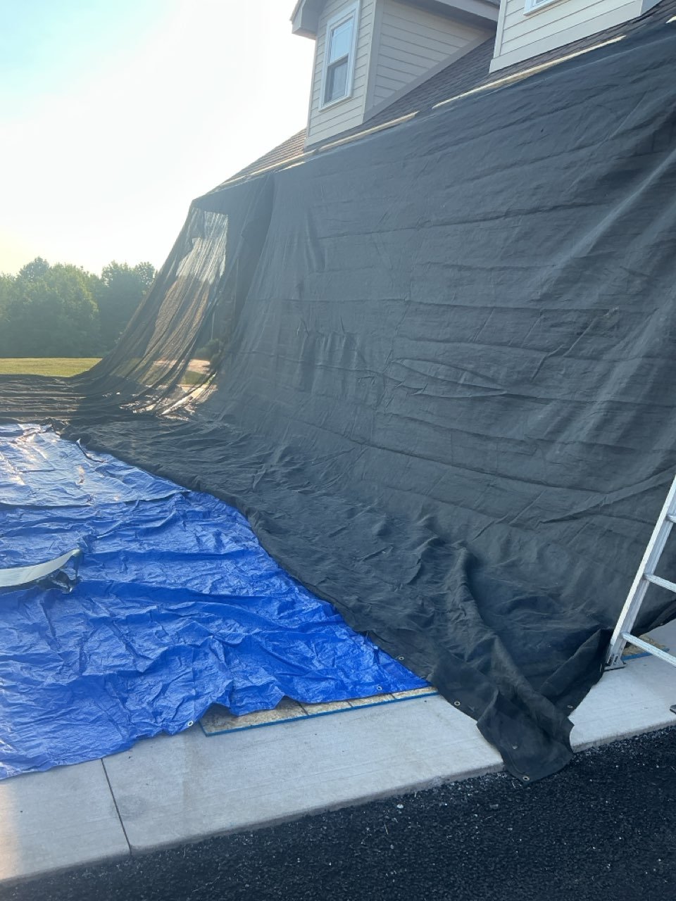 Ground to roof tarping on Muncy PA home during roof replacement