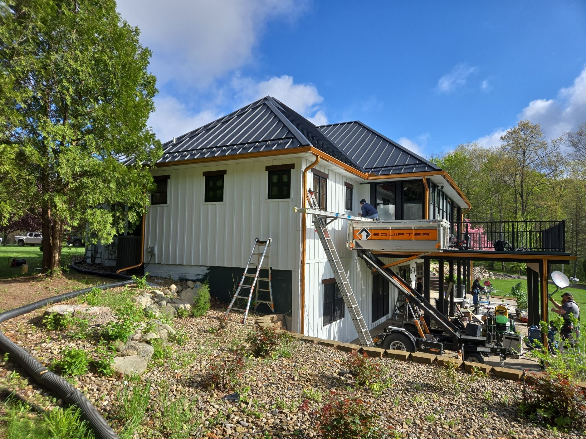 Home renovation with new roof siding soffit fascia and gutters for Michigan home