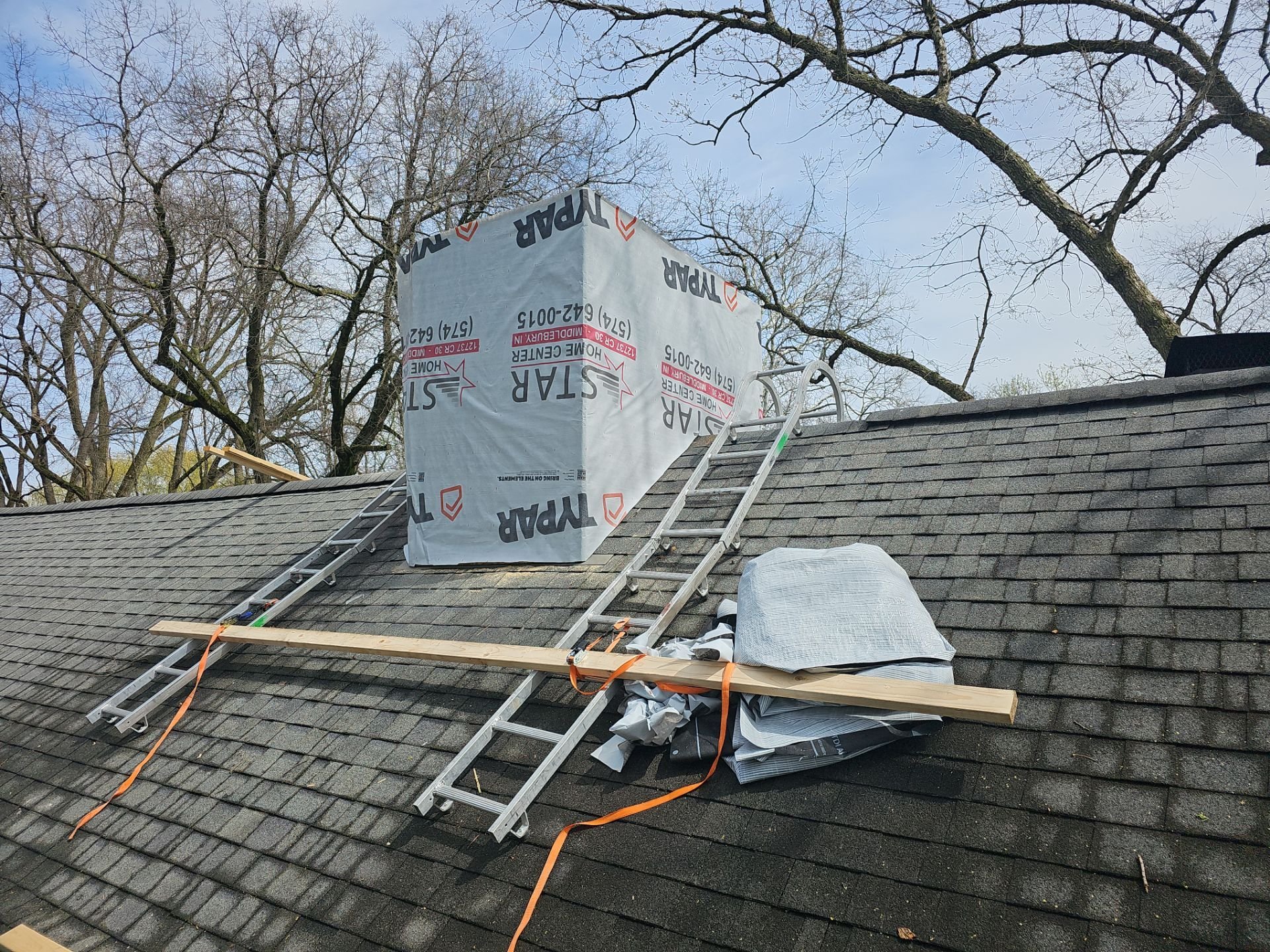 Leaking chimney getting built over