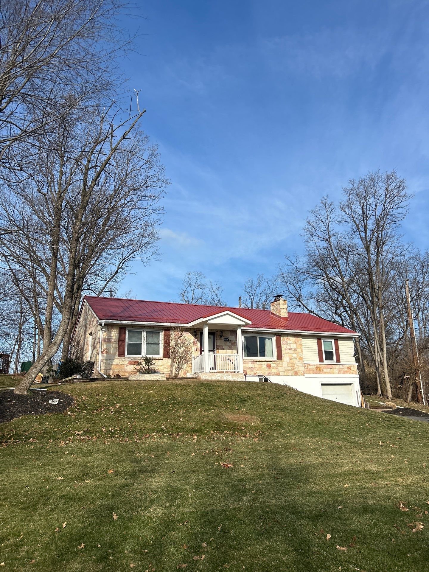 Metal roof replacement in Harrisburg PA using Pro Appearance Metal in Rustic Red