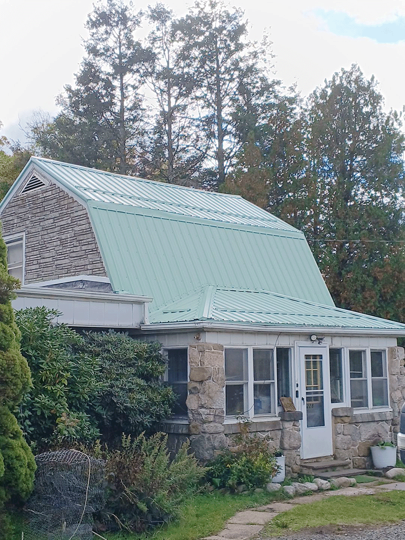 Mountain Top PA metal roof replacement in Patina Green