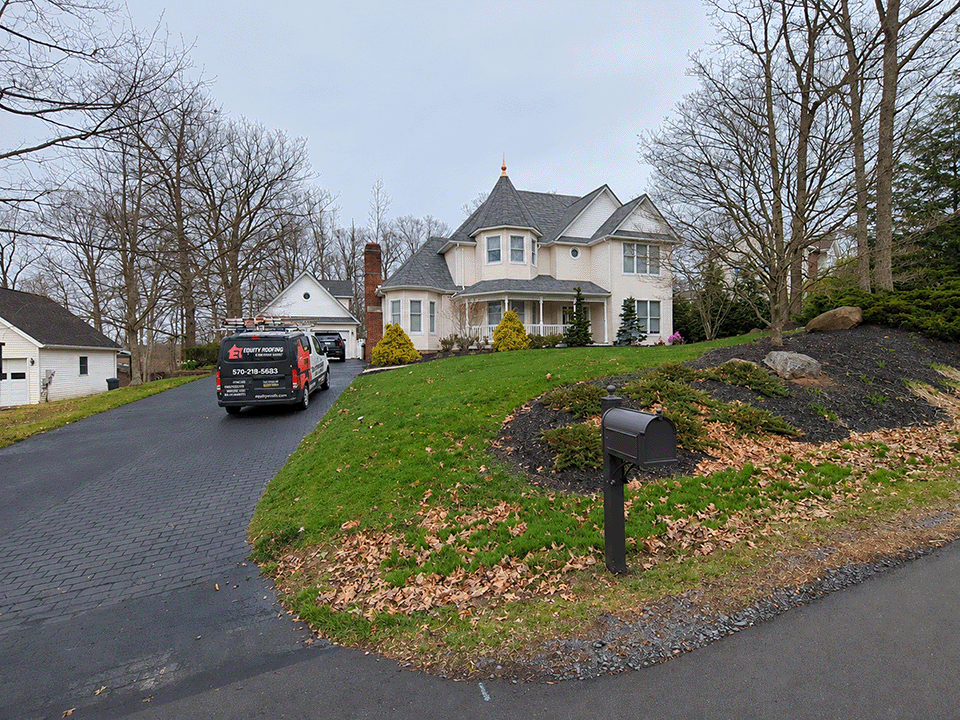 Mountain Top PA roof replacement with new finial using Owens Corning Duration shingles in Williamsburg Gray