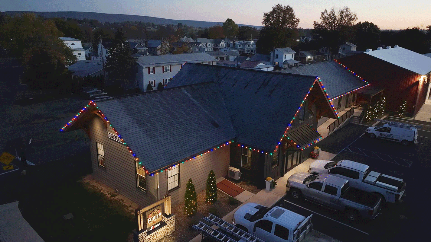 Professional holiday light installation for commercial building in Central PA