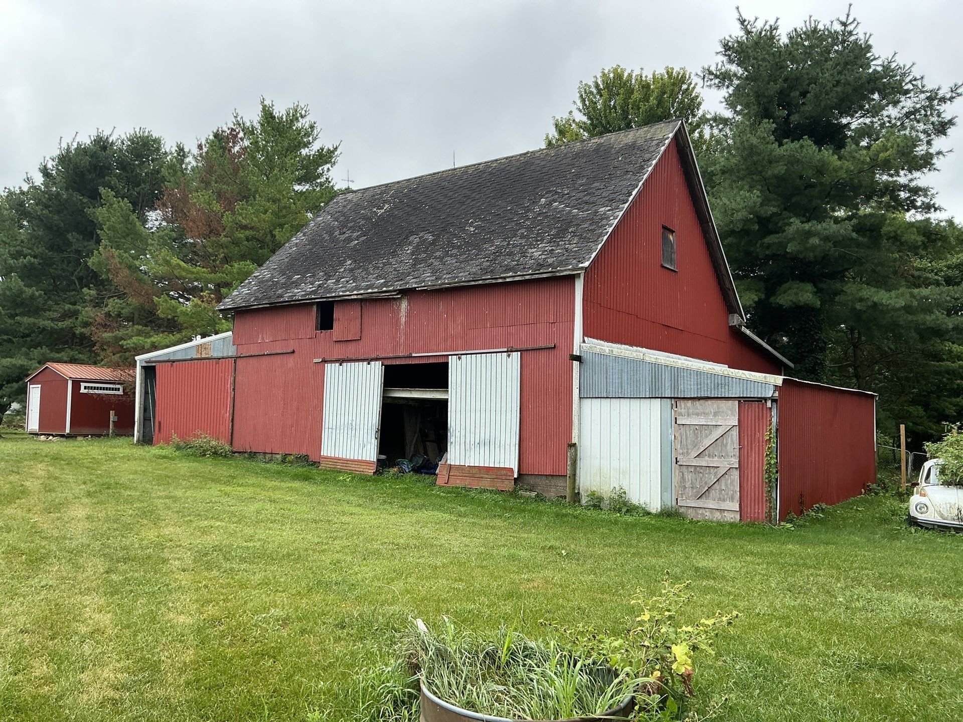 Michigan barn house with old shingle roof