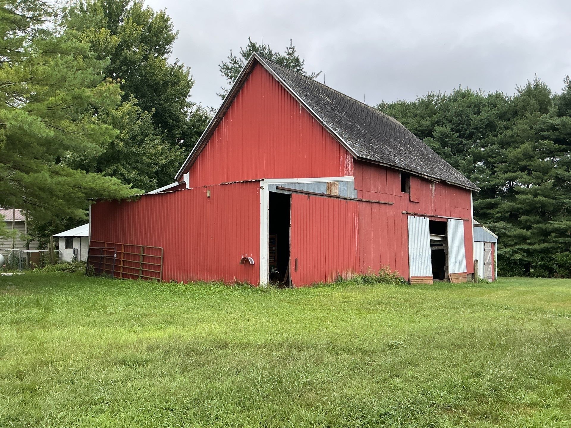 Michigan barn house with an old shingle roof