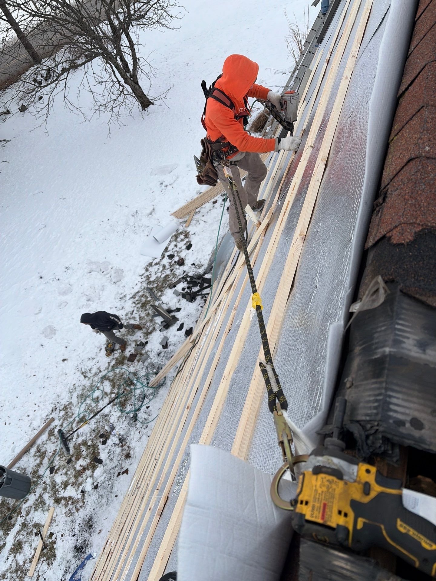 Equity Roofing installing a metal roof on A-Frame roof in Middleburg PA