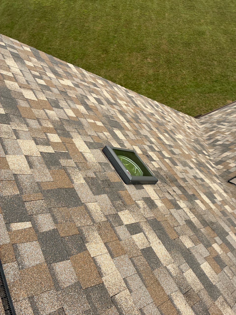 skylight reflashed with shingle roof replacement for Muncy PA home