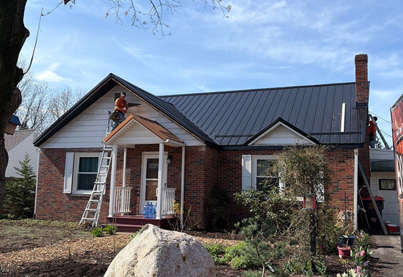 standing seam metal roof on cape cod home