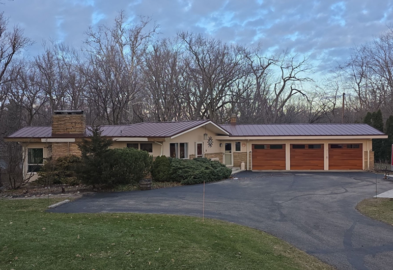 standing seam metal roof on ranch home